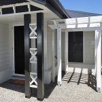 This white Pergola has been set just under the soffit of the residence and the X screening has been made to complement the existing aspect features.