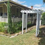 This Pine Arbour has been painted white to compliment the style and features of this 1915 Queenslander house in Indooroopilly.