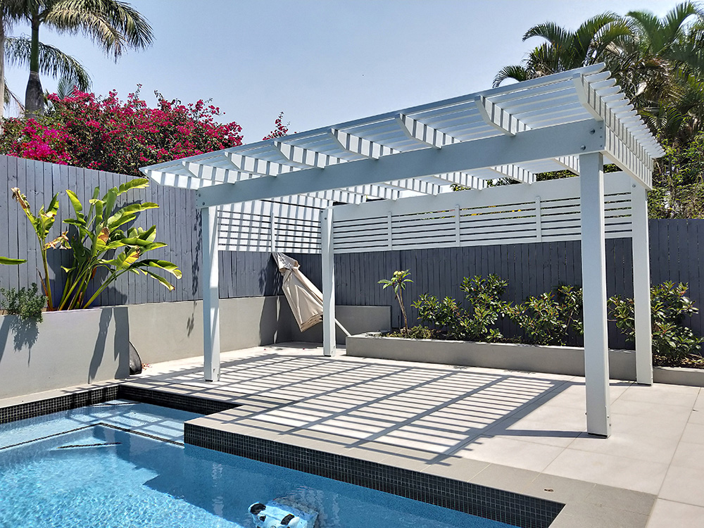 This pine Pergola is painted in Light Grey, Dulux Cold Steel and it has created an additional entertainment area out by the pool.