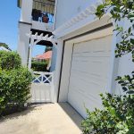 This little Eyebrow Pergola sits just above the garage door and it looks fantastic on this side wall of the residence.