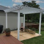 Painted timber pergola attached to existing cement slab.