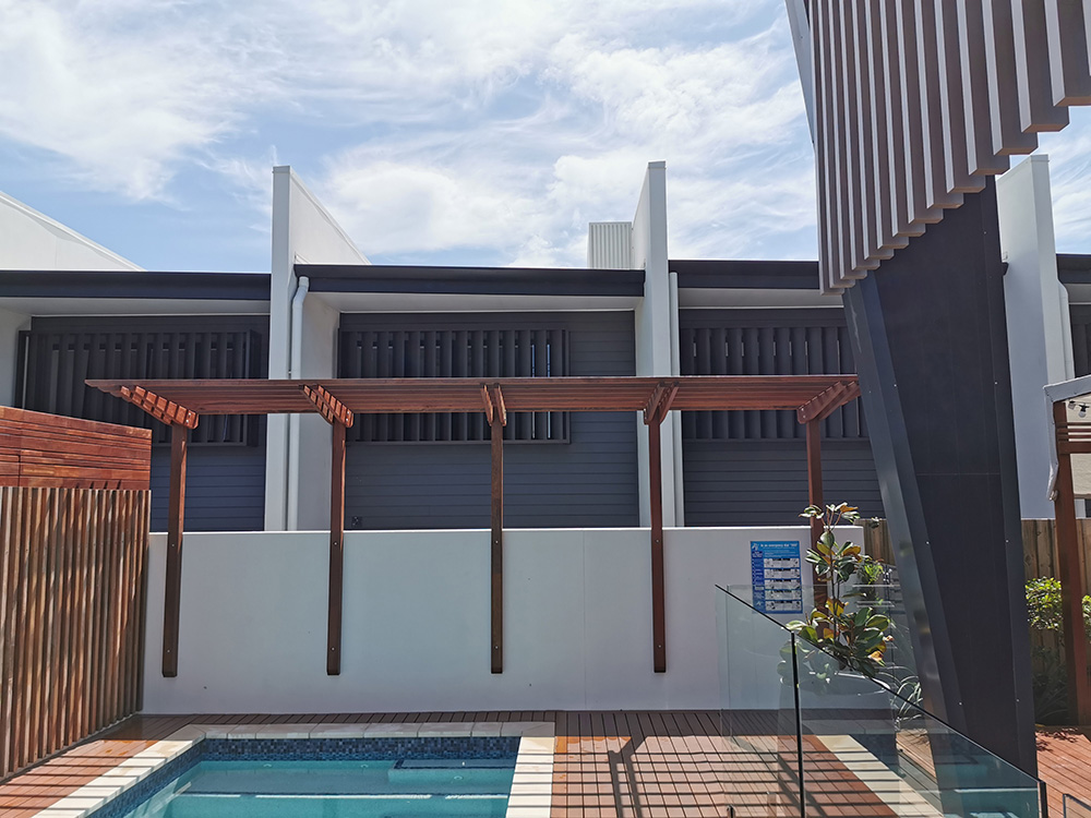 The Spotted Gum Cantilever Pergola has been added to the pool area for this residence at The Grange.