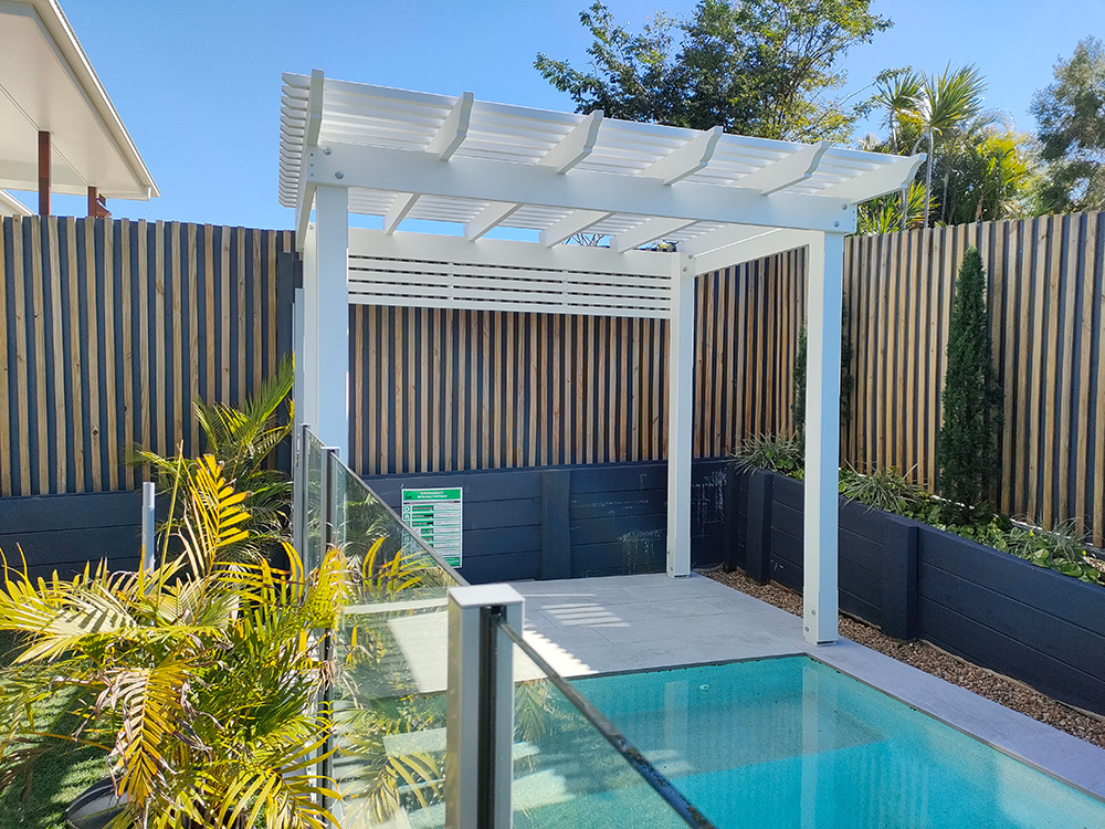 The Pergola looks fantastic fit into the pool area in contrast to the painted Pine fence to the rear and sides of the pool.