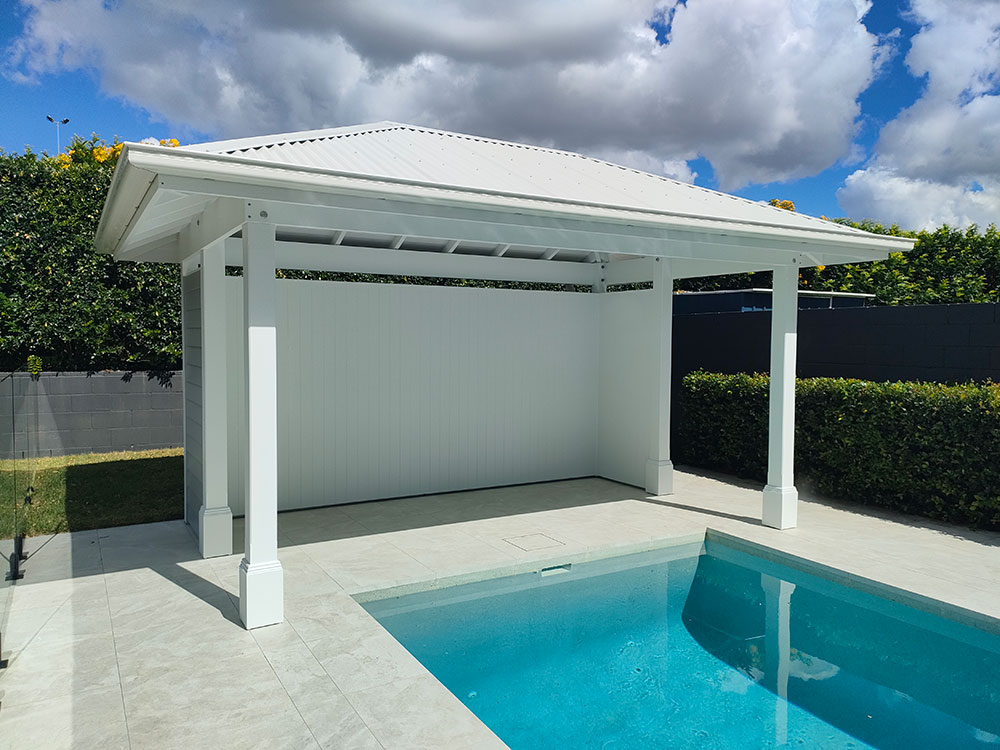 This White and Grey Pool Cabana creates a Wow when you look out from the house towards the new Pool Cabana. It is simply stunning!