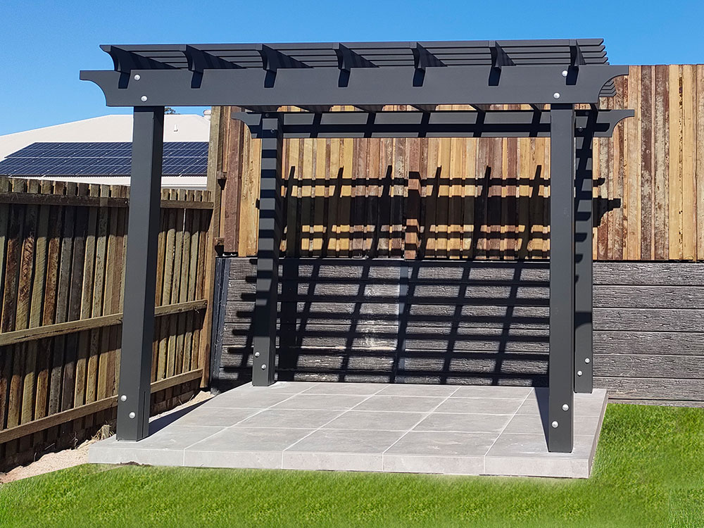 This Pine Pergola has been painted in Monument and installed at a new residence in Upper Kedron. It will look fantastic when the vines start to cover it and when all the gardens are fully landscaped.